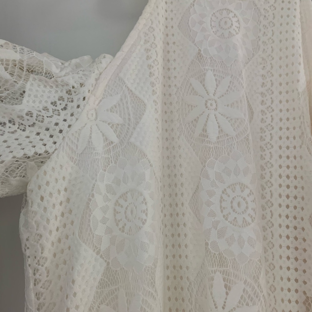 Ivory lace dress.